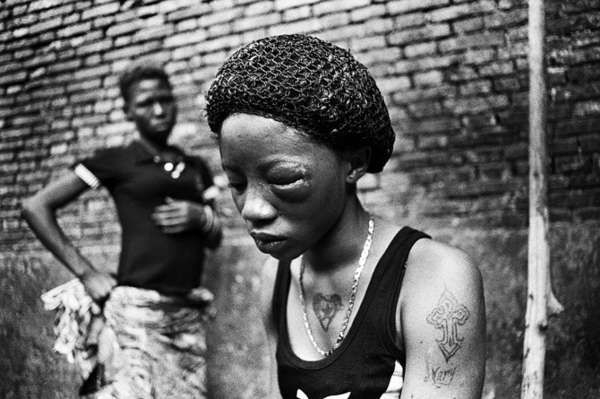 Kim Thue fotografijose - dramatiški Siera Leonės šiukšlyno vaizdai