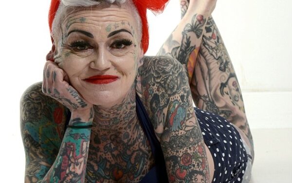 Ekstremalu: moteris po skyrybų išsitatuiravo 80 procentų savo kūno! (foto)