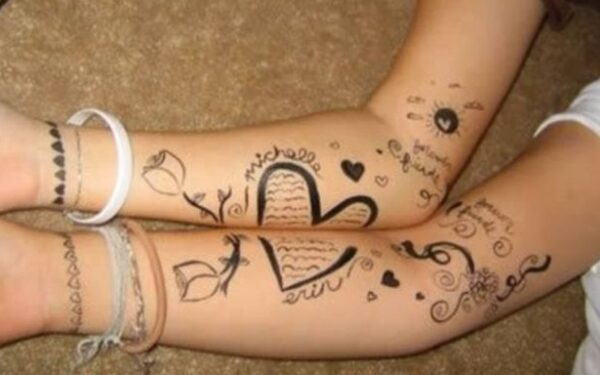 Vienodos tatuiruotės – poros meilės ar kvailumo išraiška? (Foto)