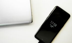 black Samsung Galaxy S8 on desk