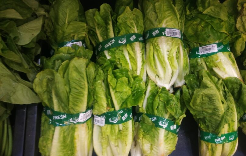 a group of bags of green vegetables