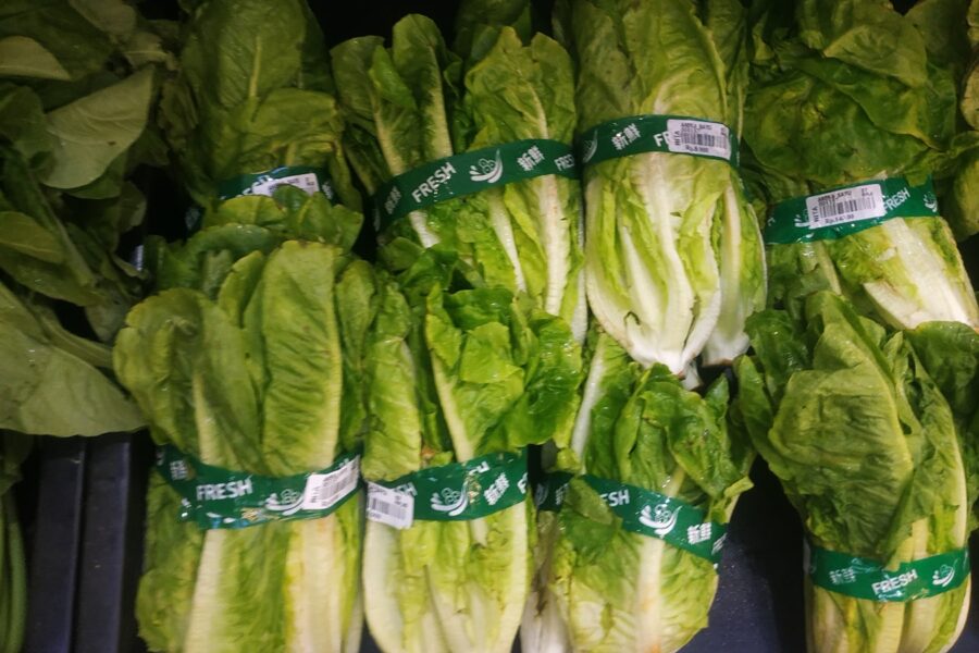 a group of bags of green vegetables