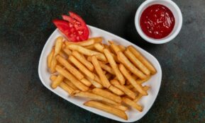 a plate of french fries and sauce