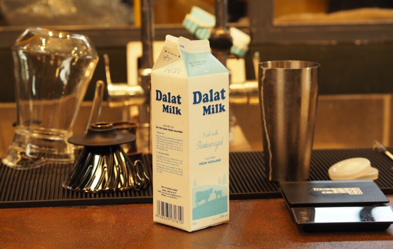 a carton of milk sitting on top of a table