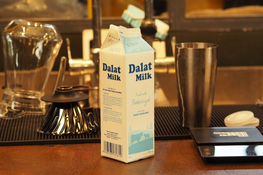 a carton of milk sitting on top of a table