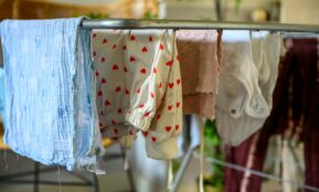 Clothes drying on a rack indoors