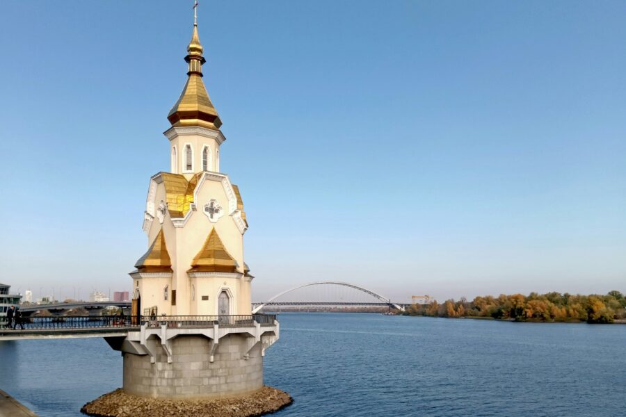 A large body of water with a church on top of it