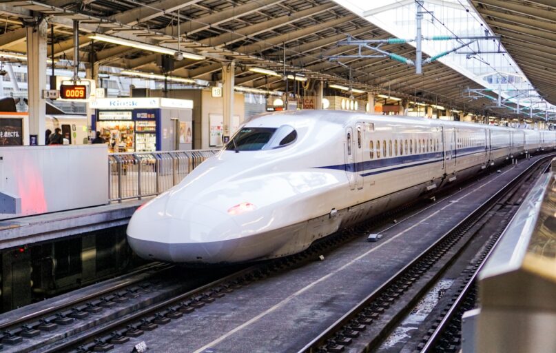 time lapse photography of white train