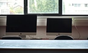 Two computer monitors on a desk