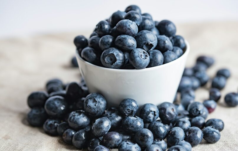 blueberries on white ceramic container
