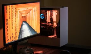 black flat screen computer monitor turned on near black computer keyboard