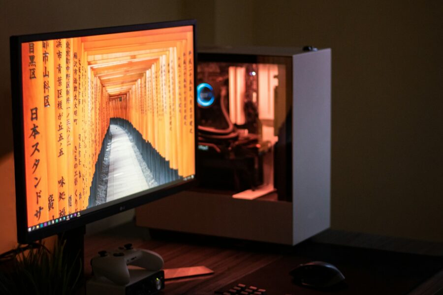 black flat screen computer monitor turned on near black computer keyboard
