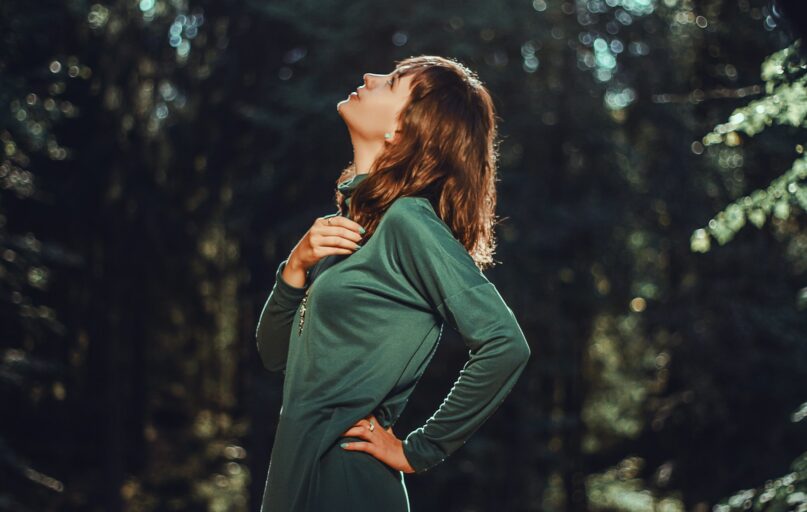 selective focus photo of woman looking up