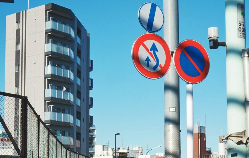round white-and-blue signages