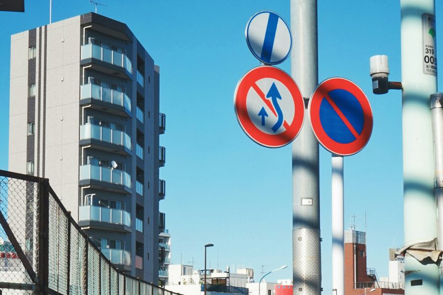round white-and-blue signages