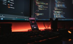 black remote control on red table