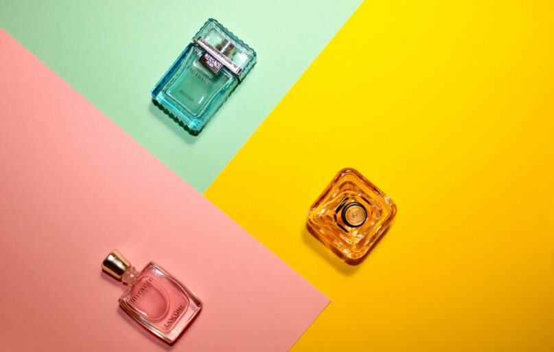 a bottle of perfume sitting on top of a table