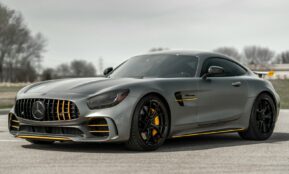 black mercedes benz coupe on gray asphalt road