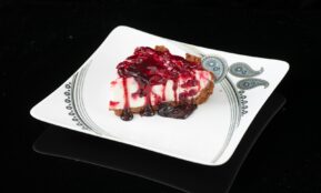 sliced chocolate cake on white ceramic plate