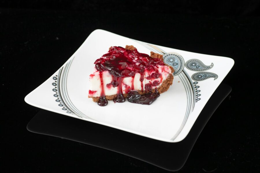 sliced chocolate cake on white ceramic plate