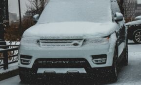 snow covered Land Rover Range Rover SUV