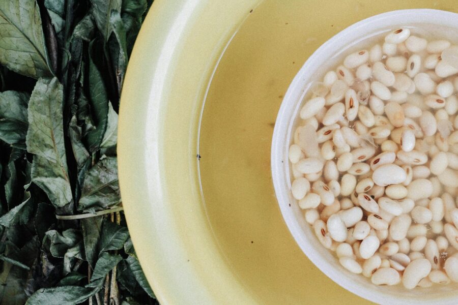 white beans in yellow bowl