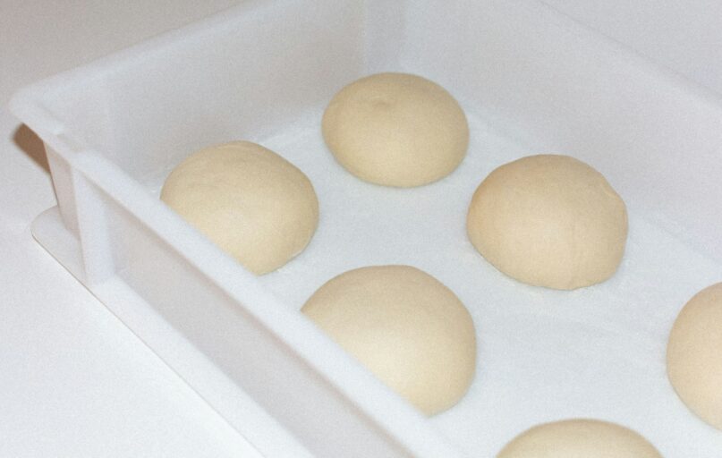 a box of doughnuts sitting on top of a counter