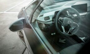 black car side mirror during daytime
