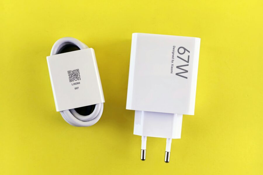 A couple of white wires sitting next to each other