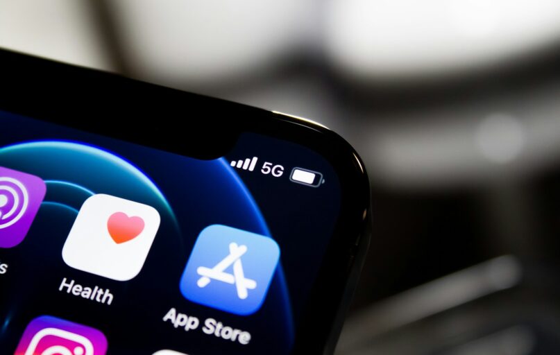 black iphone 4 displaying icons