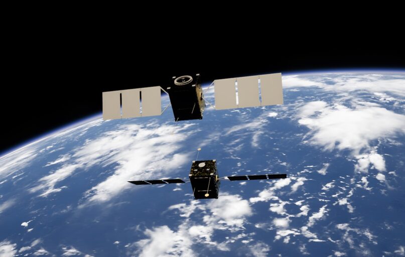 a satellite satellite flying over the earth