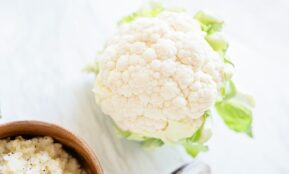 white flower on brown wooden round pot