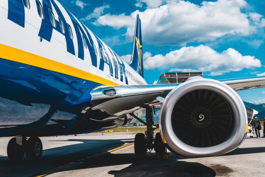 photo of blue and white passenger plane turbine