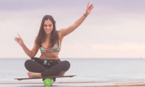 woman balancing on board