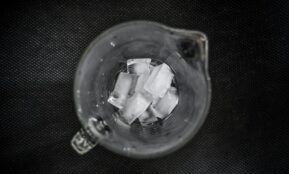 ice cubes inside clear glass pitcher