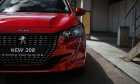 a red car parked on the side of the road