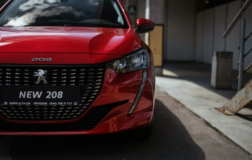 a red car parked on the side of the road