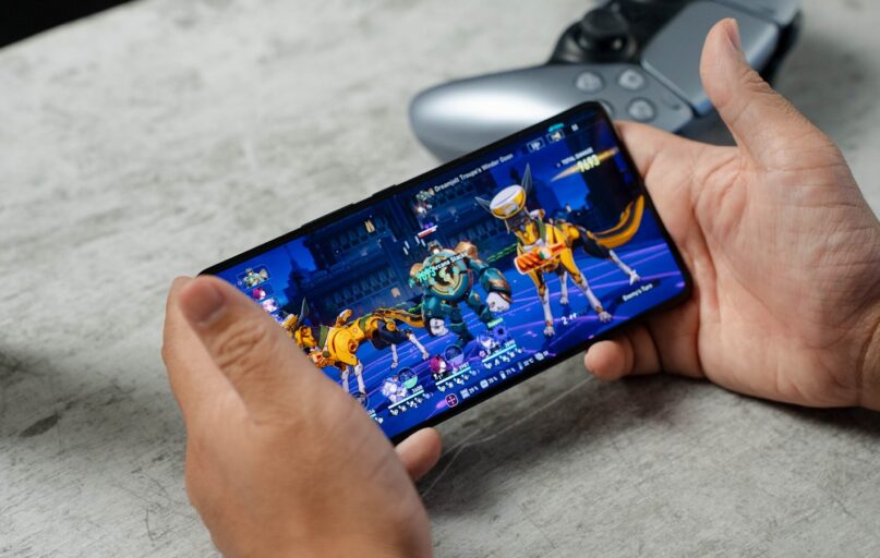 A person is playing a video game on their phone