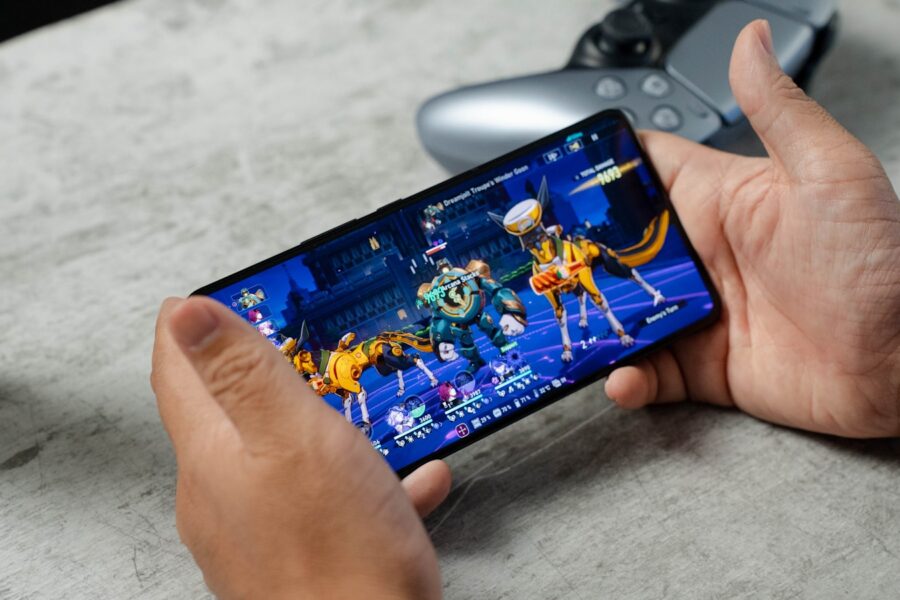 A person is playing a video game on their phone