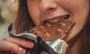 woman eating chocolate