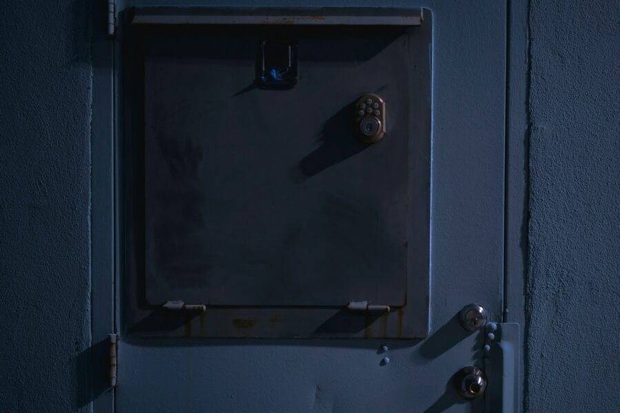 A closed metal door with a lock