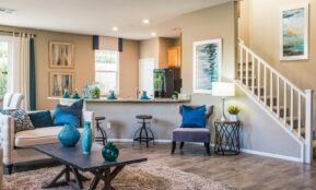 black wooden table on rug