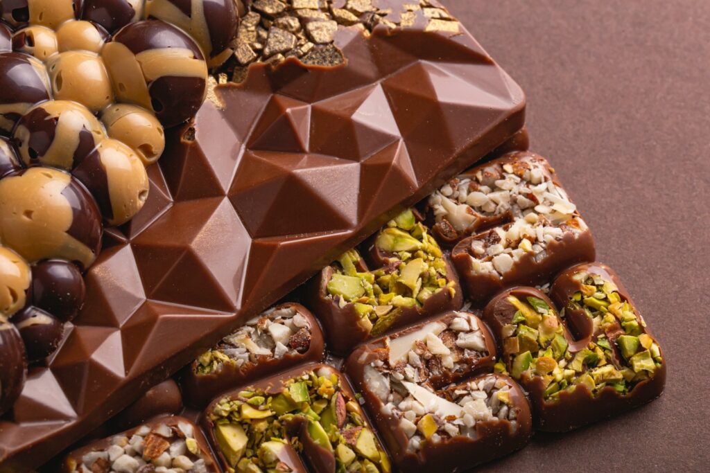 a variety of chocolates and nuts on a table