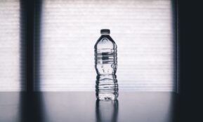 clear drinking bottle filled with water