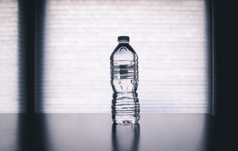 clear drinking bottle filled with water