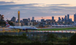 A large jetliner sitting on top of an airport tarmac