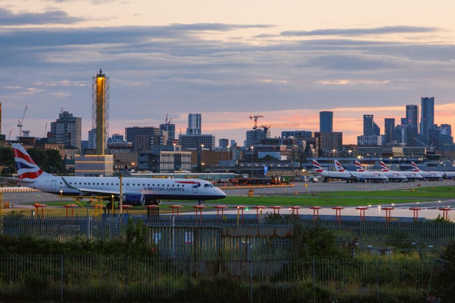 A large jetliner sitting on top of an airport tarmac