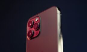 red and black device on white surface