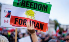 a person holding a sign