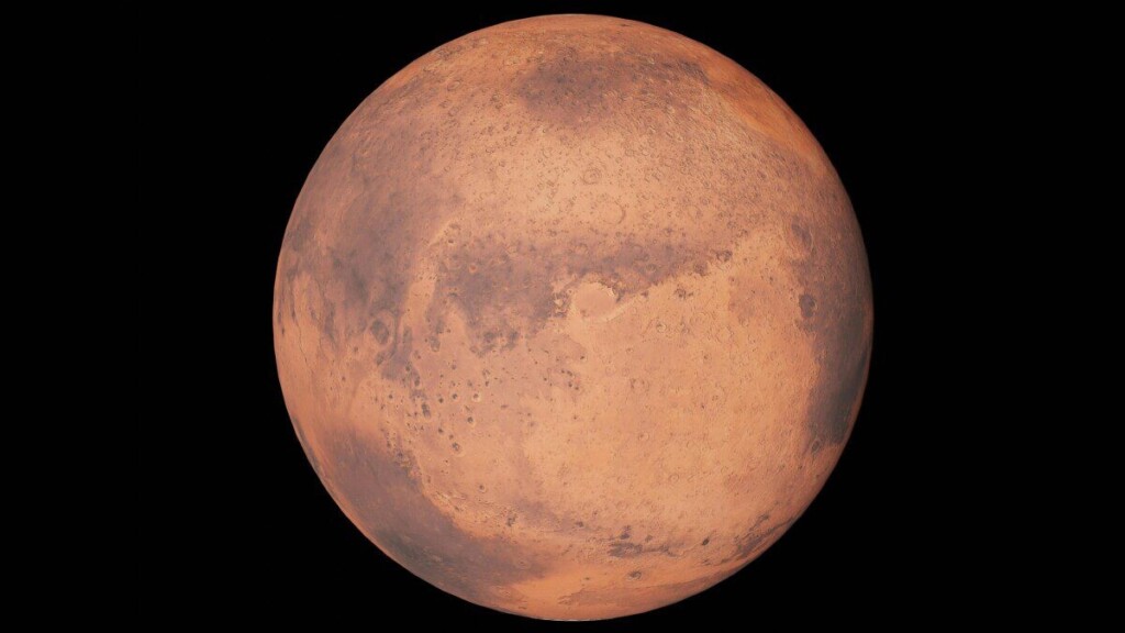 Detailed image of Mars highlighting surface features against a black space background.